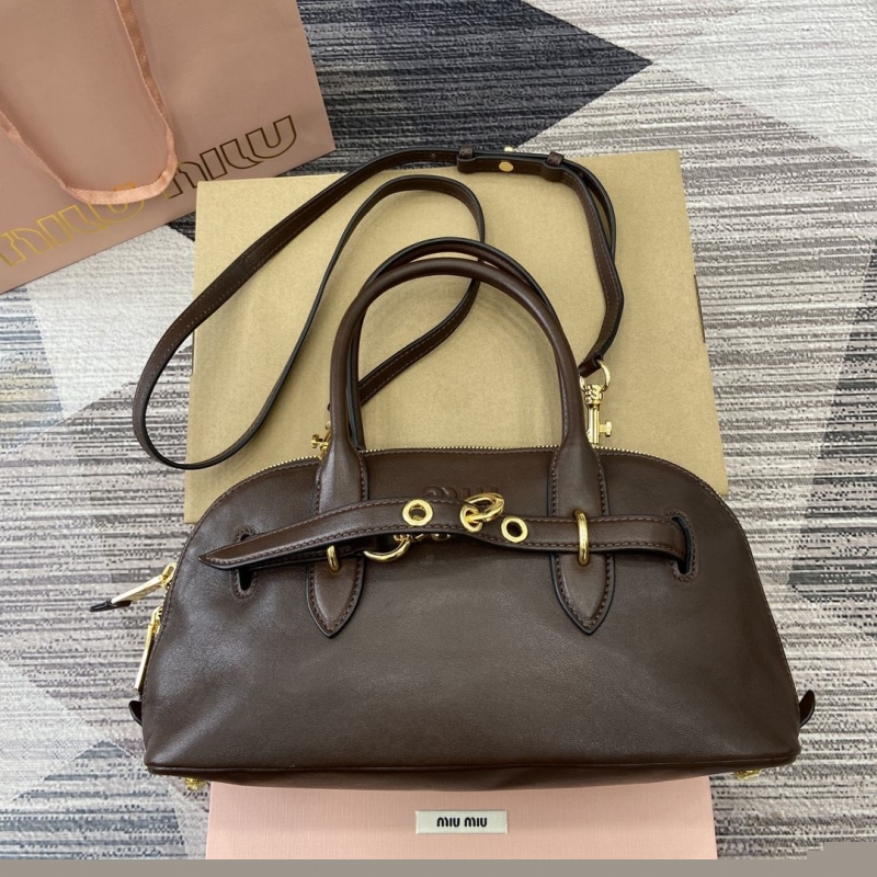 G*u*i top handle bags